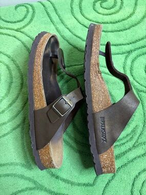Birkenstock Gizeh brown or bronze thong sandals.